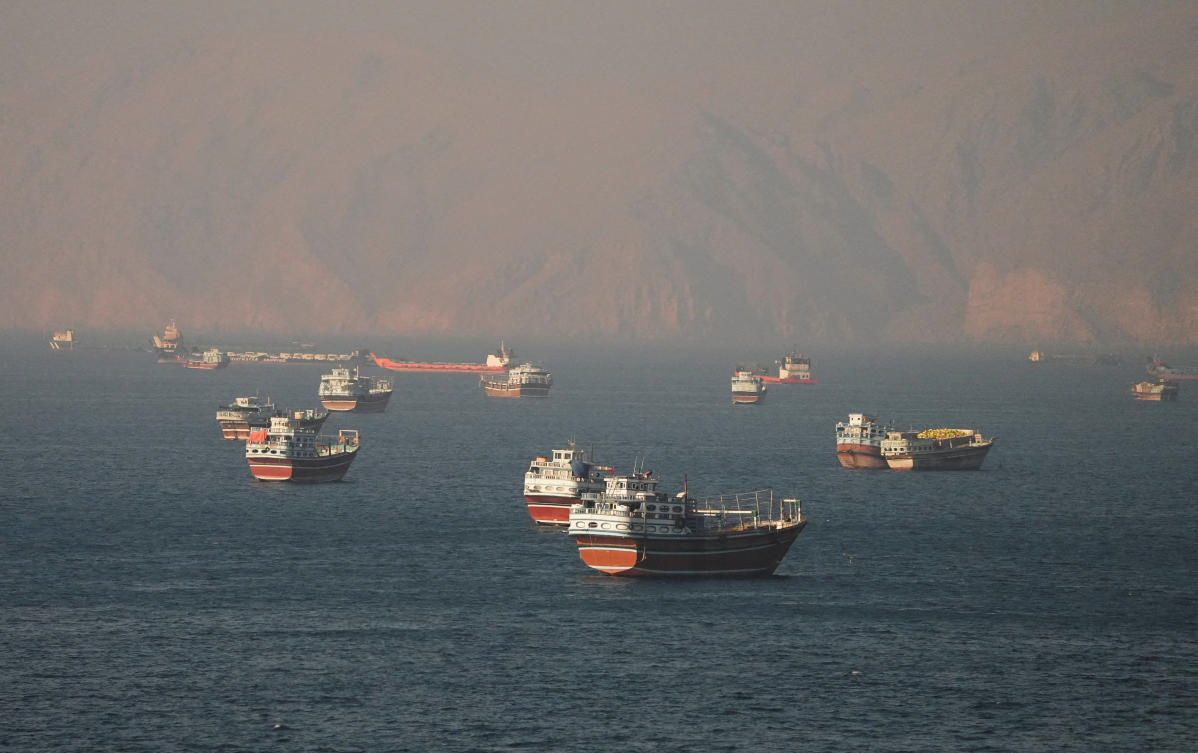 Above, vessels at the Strait of Hormuz, as seen from Musandam, Oman on June 15, 2026. The Strait of Hormuz bottleneck is an immediate priority during the 60-day period to for the US and Iran to seal a full-scale peace deal. (Reuters)