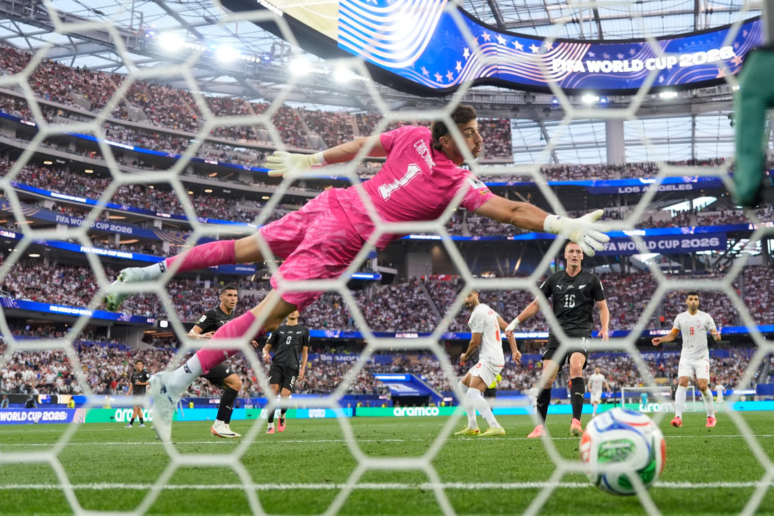 New Zealand goalkeeper Max Crocombe is beaten by a header from Iran’s Mohammad Mohebbi to score their second goal during their World Cup Group G match on June 15, 2026. (AP)