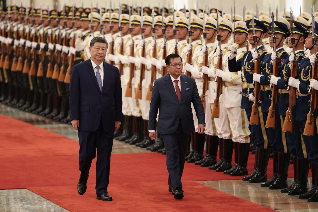 Chinese President Xi Jinping and Myanmar's President Min Aung Hlaing attend a welcoming ceremony at the Great Hall of the People in Beijing, China. (Reuters)