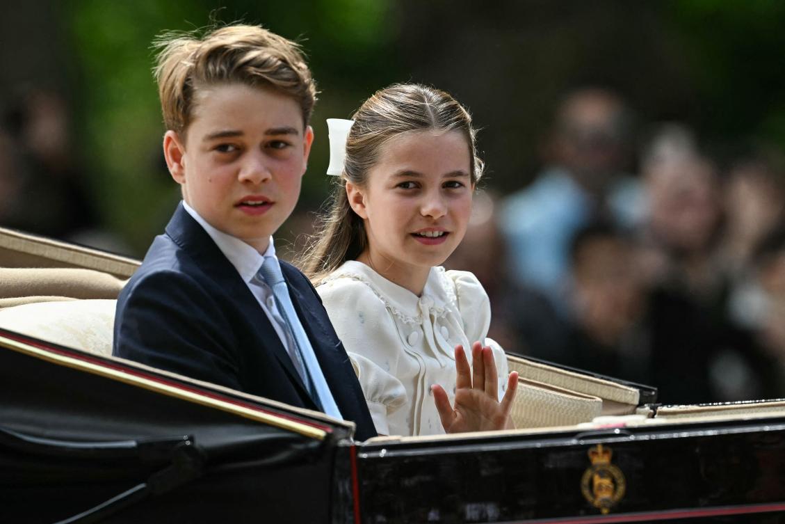 Britain's Prince George of Wales and Britain's Princess Charlotte of Wales make their way back to Buckingham Palace from Horse Guards Parade during the King's Birthday Parade "Trooping the Colour" in London on June 13, 2026. (AFP)