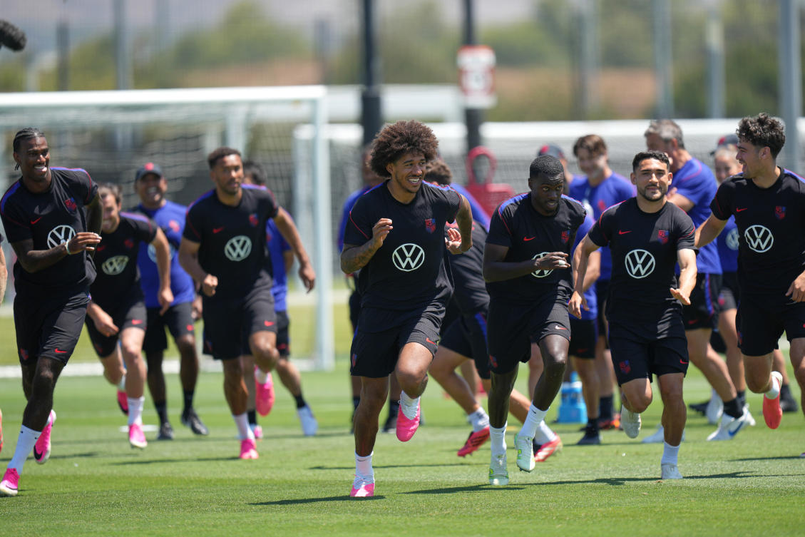 United States’ Chris Richards, center, exercises with teammates during a training session ahead of their FIFA World Cup match against Australia in Irvine, California, Jun. 16, 2026. (AP)
