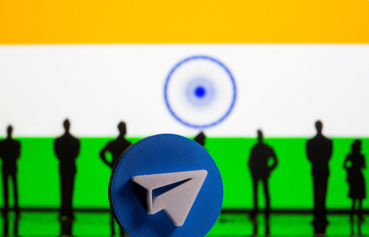 FILE PHOTO: A 3D-printed Telegram app logo and small toy figurines are seen in front of India flag in this illustration taken May 4, 2021. (Reuters)