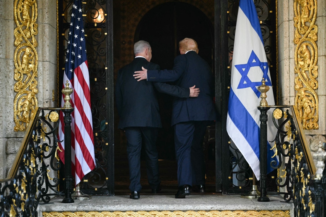 US President Donald Trump and Israeli Prime Minister Benjamin Netanyahu walk inside after Netanyahu arrived at Trump’s Mar-a-Lago residence in Palm Beach, Florida, US. (AFP)