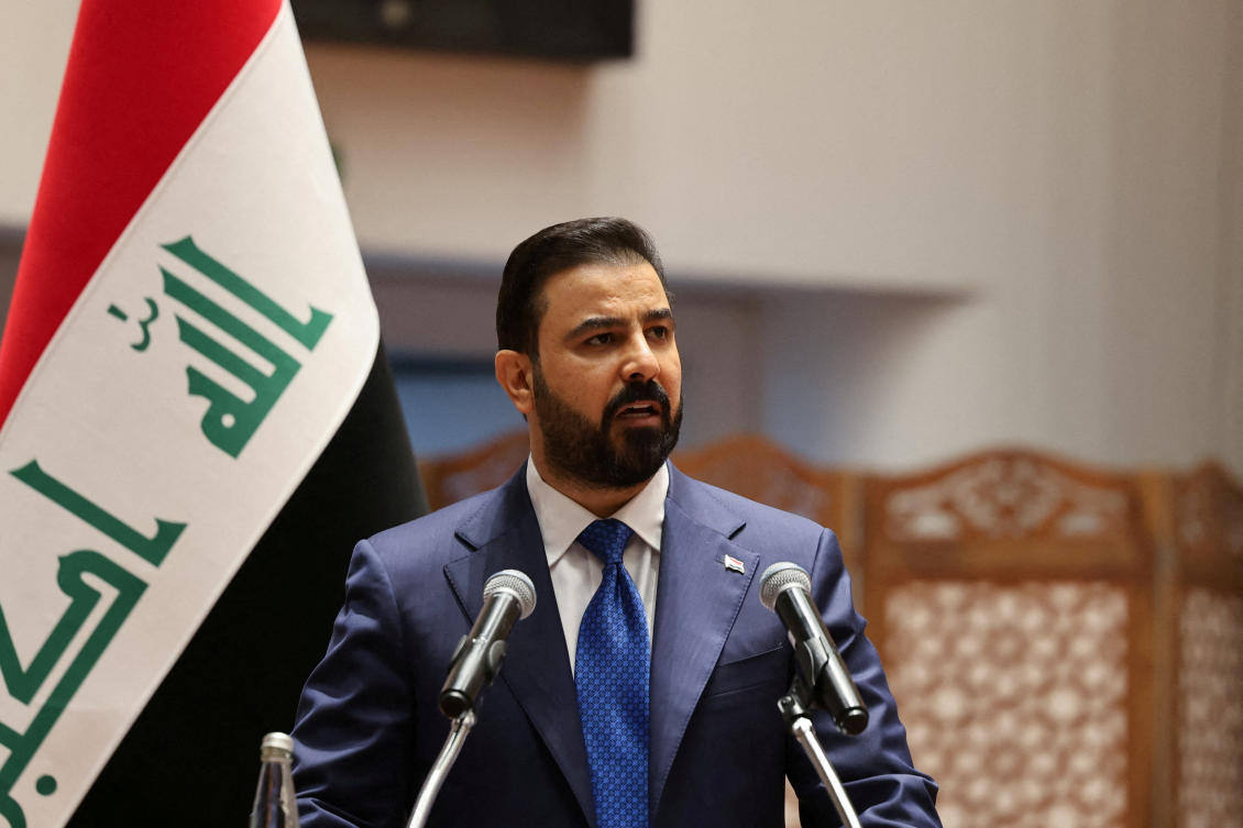 Iraqi Prime Minister-designate Ali Al-Zaidi speaks during a parliamentary session to vote in a new government at the parliament headquarters in Baghdad, Iraq. (REUTERS)