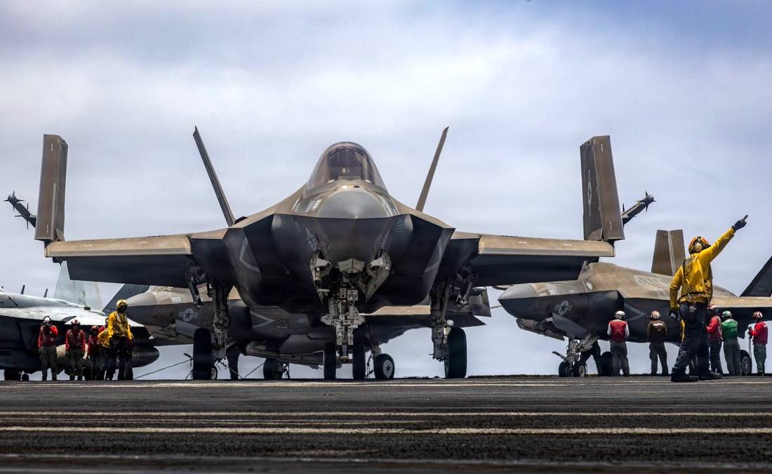 Above, US Navy fighter jets prepare to take off from USS Abraham Lincoln at the Arabian Sea. (X: @CENTCOM)