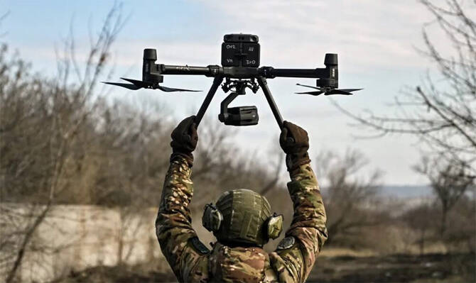 The CEO of UFORCE, a Ukrainian producer of attack drones, flew to Tokyo in April with a pitch for Japanese officials and defense contractors: build thousands of our drones to defend yourself and allies. (AFP/File)
