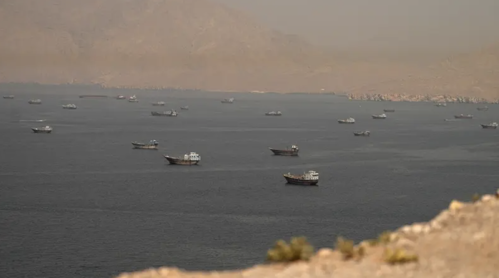Vessels at the Strait of Hormuz, as seen from Musandam, Oman, June 18, 2026. (AFP/File Photo)