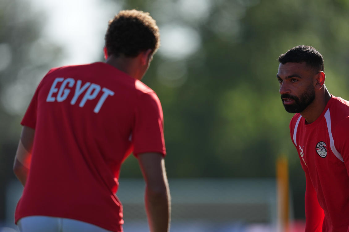 Egypt's Hamza Abdelkarim, left, and Mohamed Salah, right, work out during a training session Saturday, June 20, 2026, on the eve of the team's World Cup Group G soccer match against New Zealand in Vancouver, British Columbia. (AP Photo/Abbie Parr)