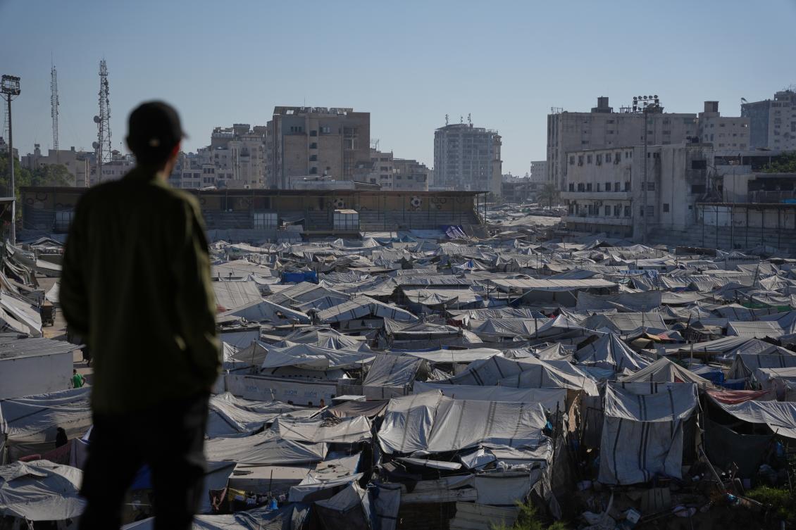 Tents of displaced Palestinians occupy the field of the Yarmouk soccer stadium that was damaged during the Israel Hamas war, in Gaza City, Saturday, June 20, 2026. (AP Photo/Abdel Kareem Hana)