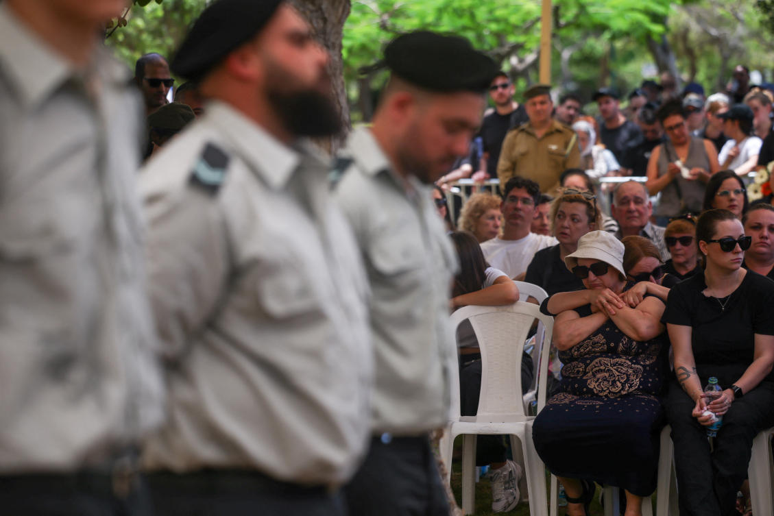 Mourners attend the funeral of Israeli soldier Alexander Filin, who, according to the Israeli army, was wounded and later died in an explosive attack by Hezbollah in southern Lebanon, in Haifa, Israel June 21, 2026. REUTERS/Shir Torem