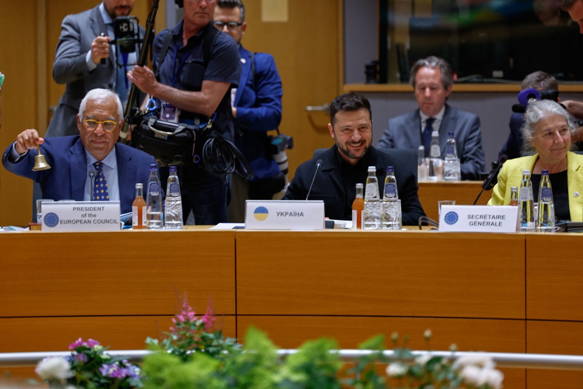 President of the European Council Antonio Costa rings a bell to signal the start of a round table meeting of EU leaders and Ukraine, attended by Ukraine's President Volodymyr Zelensky during the EU Summit at the EU headquarters in Brussels, Belgium. (AFP)