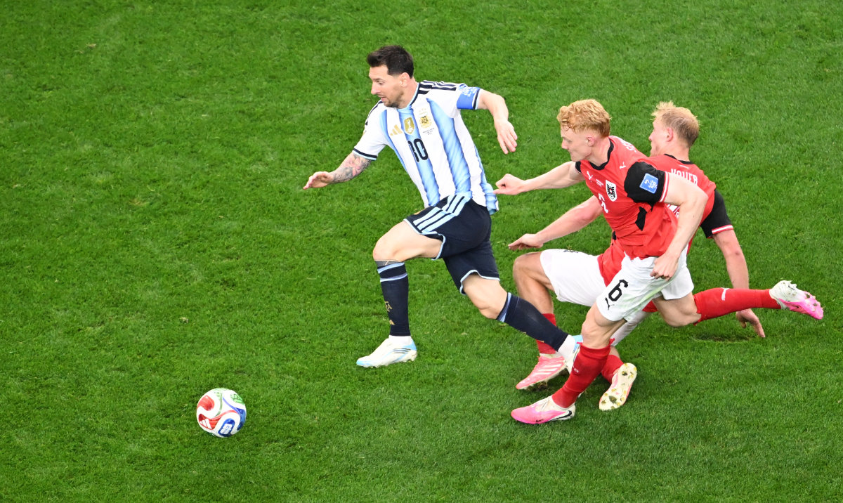 Argentina's Lionel Messi, left, is challenged by Nicolas Seiwald (6) and Austria's Xaver Schlager during the World Cup Group J soccer match between Argentina and Austria in Arlington, Texas, near Dallas, Monday, June 22, 2026. (AP)