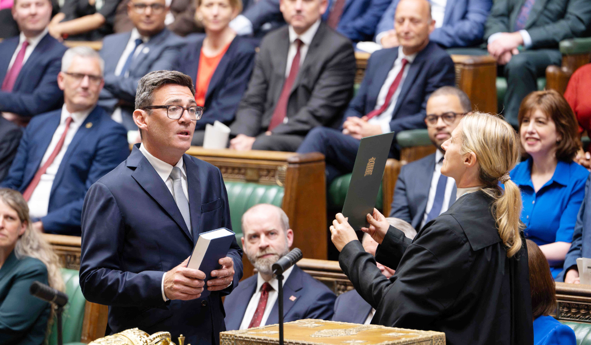 A handout photograph released by the UK Parliament shows new Labour Party MP for Makerfield, Andy Burnham being sworn in after his win in the recent by-election, in the House of Commons in London on May 22, 2026. (AFP)