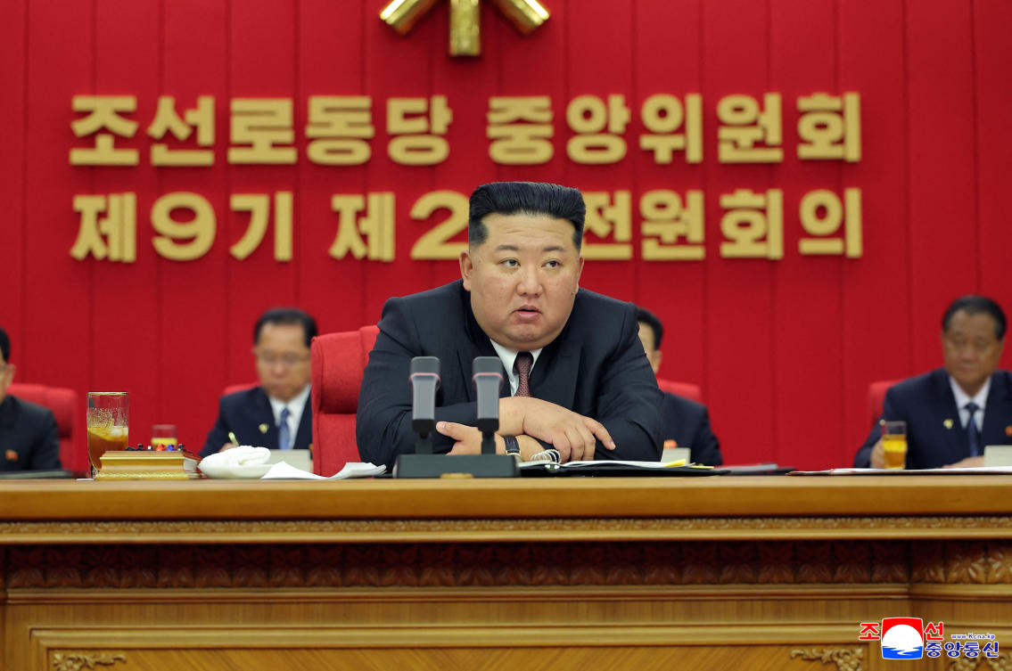 Above, North Korean leader Kim Jong Un speaks at the Second Plenary Meeting of the Ninth Central Committee of the Workers’ Party of Korea. (KCNA via KNS/AFP)