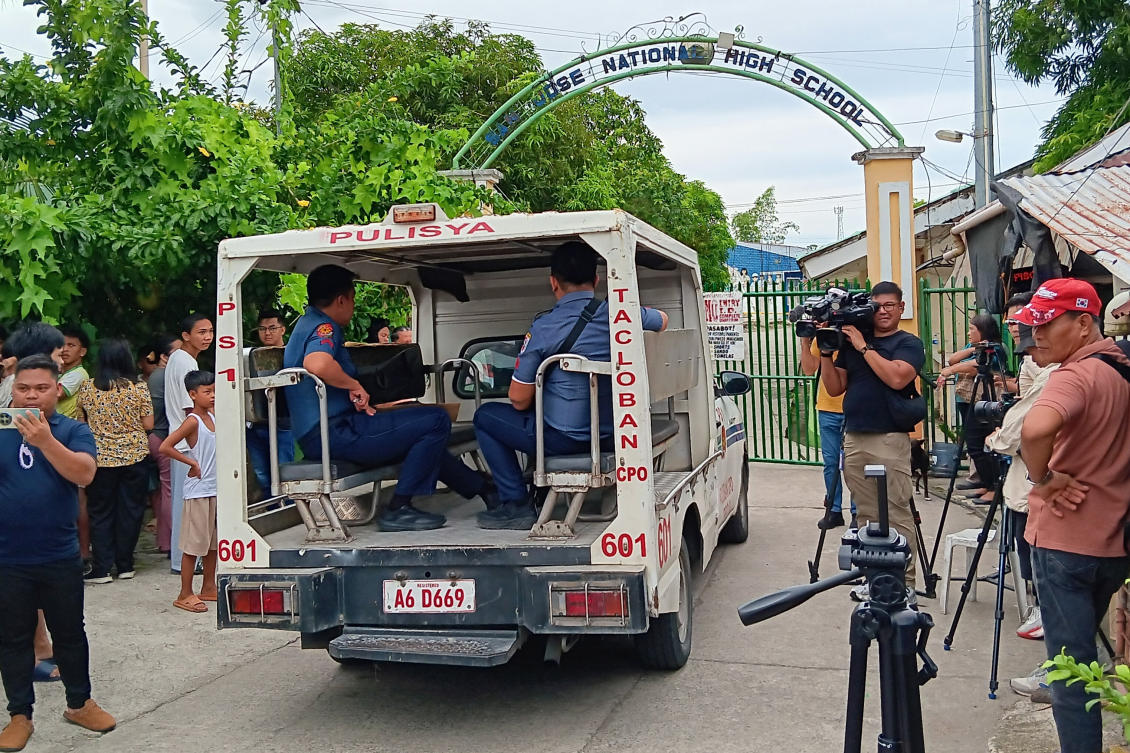 A police vehicle enters San Jose National High School a day after a shooting incident inside the school in Tacloban city, central Philippines on Monday June 22, 2026. (AP)