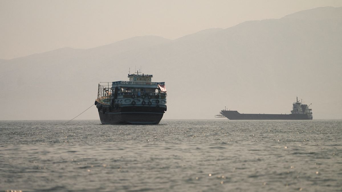Ships in the Strait of Hormuz, as seen from Musandam, Oman, on Monday. (Reuters)