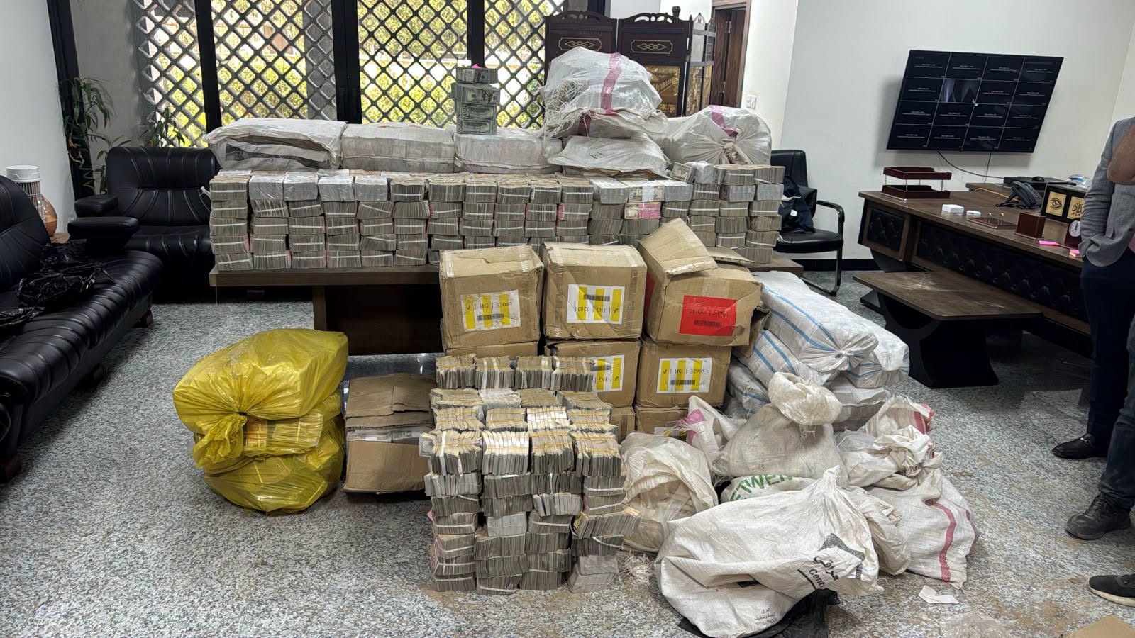 Some of the cash was hidden inside homes, while the rest was buried four meters deep. (Iraq's Supreme Judicial Council)