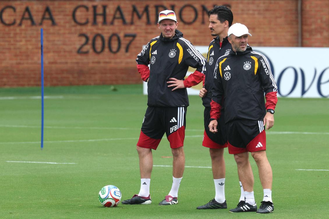 Julian Nagelsmann, Head Coach of Germany looks on with his assistent coaches Benjamin Hübner and Alfred Schreuder during a team Germany training session at Winston-Salem State University on Jun. 23, 2026 in Winston-Salem. (AFP)