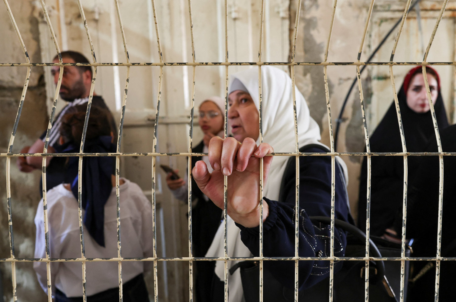 Palestinians navigate movement restrictions in Hebron, where critics say Israeli policies are eroding Oslo-era arrangements. (Reuters)