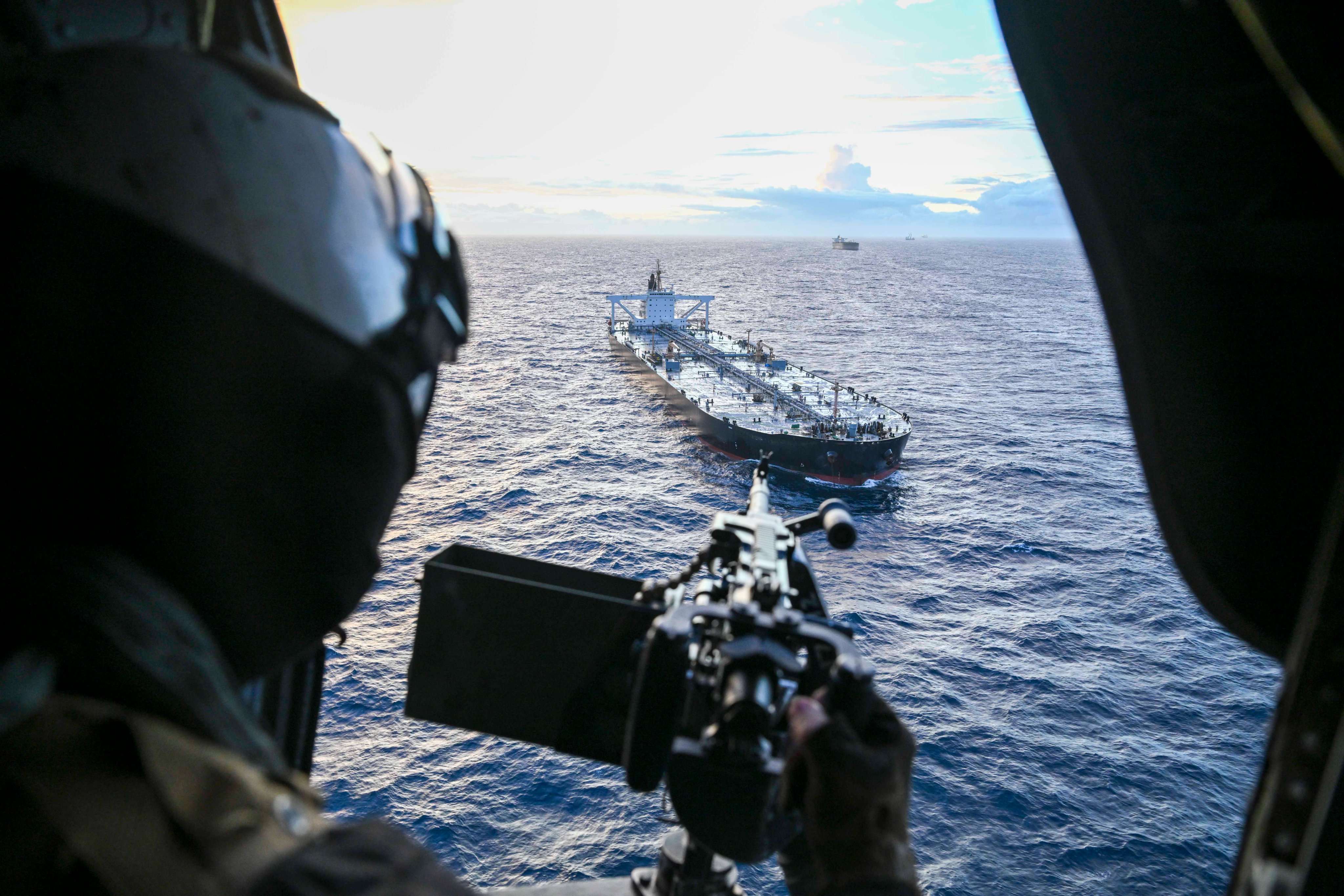US forces boarding the sanctioned stateless vessel Davina on June 5 in the Indian Ocean located in the Indian Ocean. Iranian members of the ship's crew were handed to Iranian diplomats in Pakistan on Friday. (US Pacific Command)
