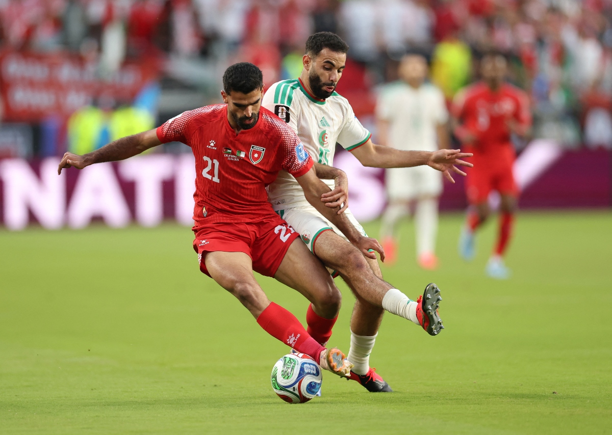 Defeats by Austria and Algeria mean Jamal Sellami’s team cannot progress to the Round of 32, but midfielder Amer Jamous insists Al-Nashama have no intention of shying away from the challenge. (AFP)