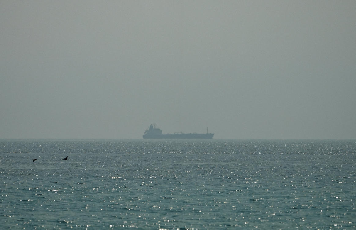 Oil tanker Al Shaffiah sails at sea near the Omani coast, as seen from Musandam, Oman, June 26, 2026. (Reuters)