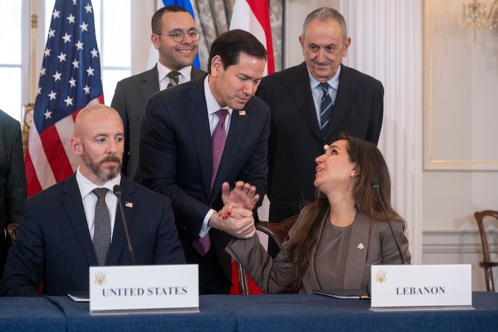 Secretary of State Marco Rubio shakes hands with Lebanon’s Ambassador to the US Nada Hamadeh, left, following a signing of the framework agreement. (AP)