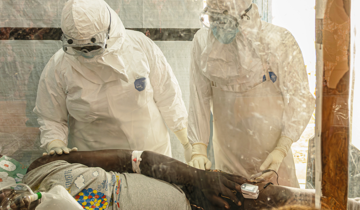 Health workers attend to an Ebola patient at the Rwampara treatment Center in Ituri, Congo, Thursday, June 18, 2026. (AP)