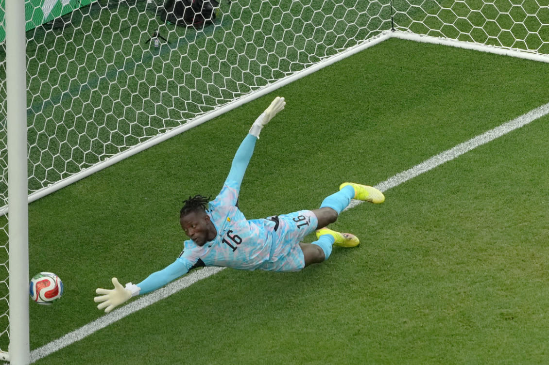 Ghana goalkeeper Benjamin Asare (16) lets the ball slip past for a Croatia's Nikola Vlasic (13) goal during the World Cup Group L soccer match between Croatia and Ghana in Philadelphia, Saturday, June 27, 2026. (AP Photo)