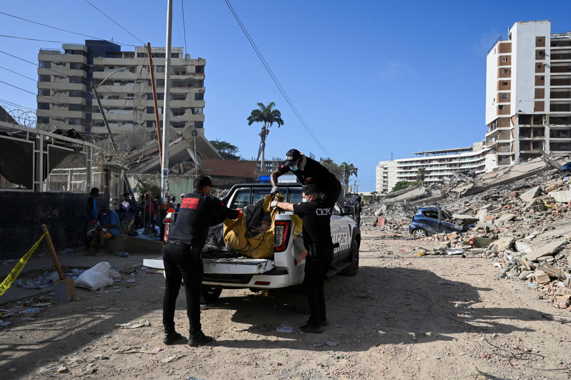 Above, rescue personnel collect bodies from the streets in La Guaira, Venezuela on June 27, 2026. (Reuters)