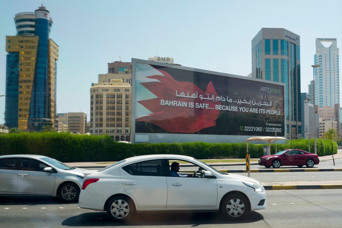 Cars drive past a billboard that reads, "Bahrain is Safe... Top US diplomat Marco Rubio was in Bahrain on June 25, after promising Gulf allies that Washington would protect their interests as it seeks to hammer out a final settlement to end the war with Iran. (AFP)
