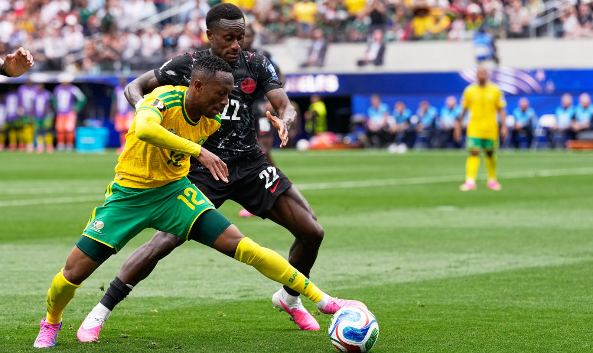 South Africa's Thapelo Maseko, front, and Canada's Richie Laryea battle for the ball during the World Cup round of 32 soccer match in Inglewood, Calif., near Los Angeles, Sunday, June 28, 2026. (AP)
