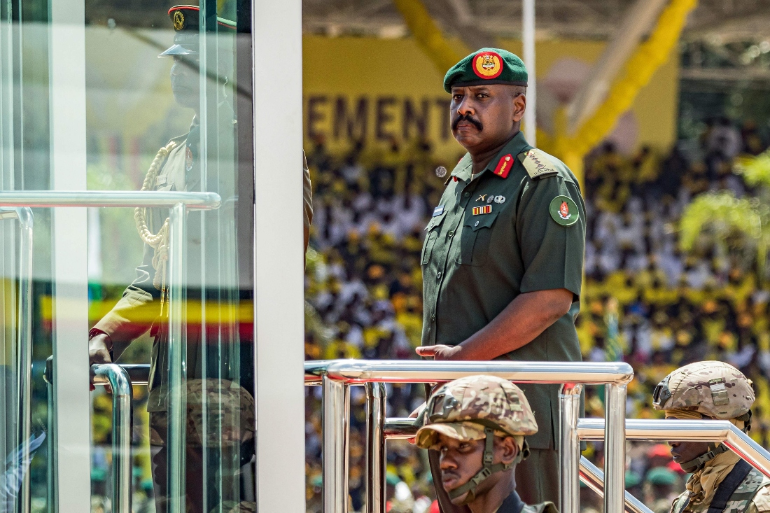 Muhoozi Kainerugaba son of Yoweri Museveni and Uganda’s Chief of Defence Forces, inspects a military parade from a vehicle at the Kololo Ceremonial Grounds in Kampala, Uganda. (AFP)