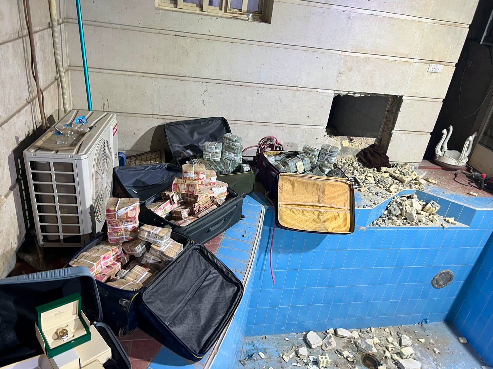 Iraqi authorities seized of $11 million and four billion Iraqi dinars as part of investigation into oil offical. (Iraq’s Supreme Judicial Council)
