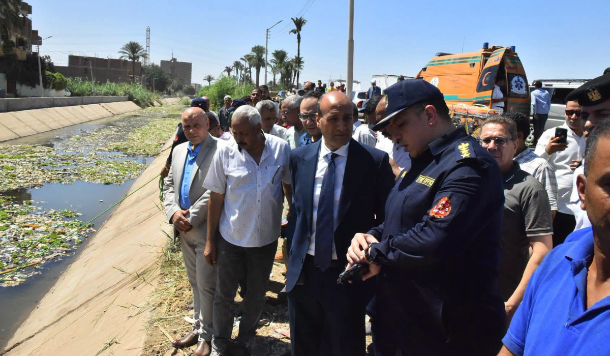 Photos posted by the governor’s office showed dozens of people gathered at the canal as people in divers’ gear searched the water. (Social media)