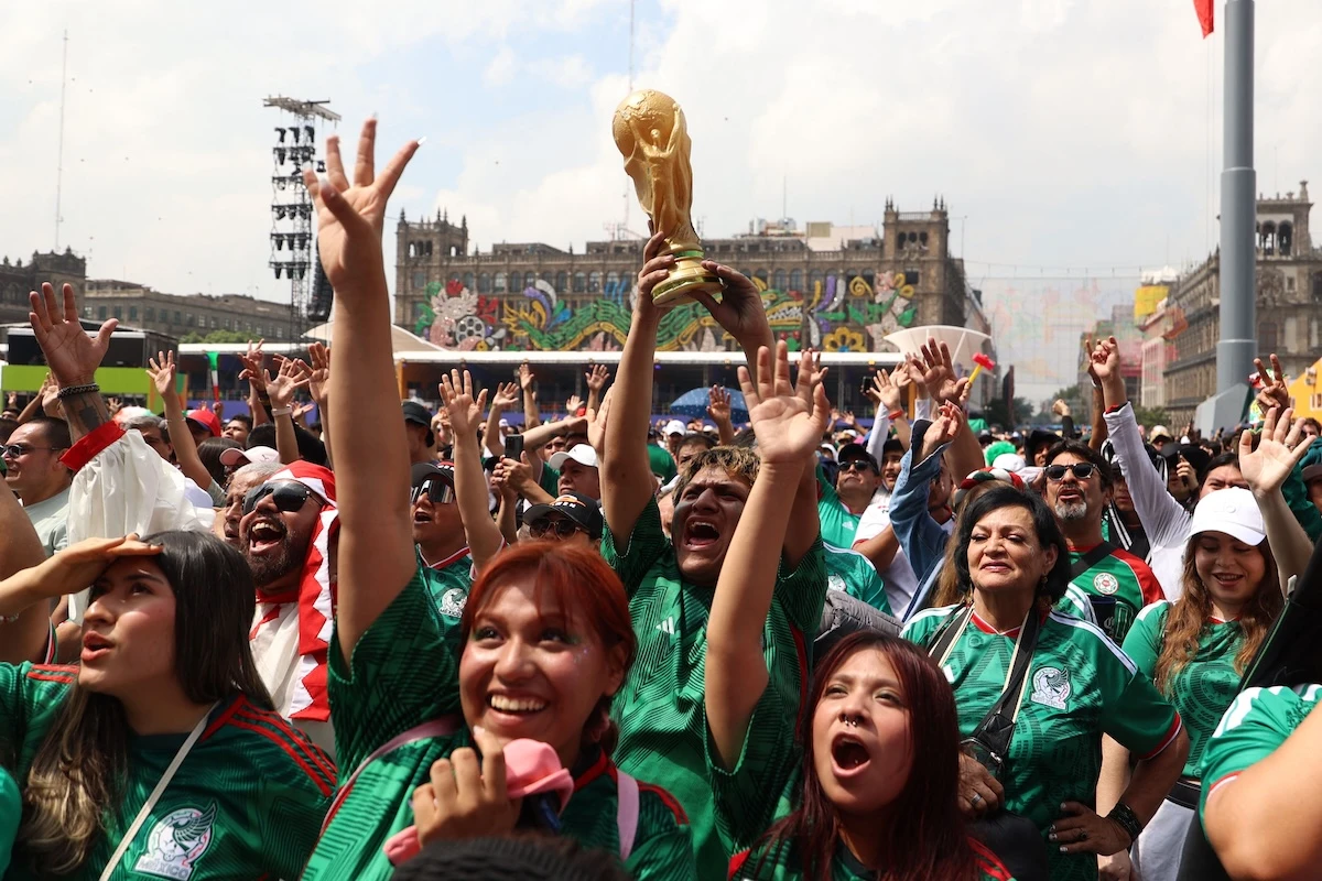 Mexican fans cheer for their team in the fan zone ahead of the FIFA World Cup 2026 Group A match between Mexico and South Africa in Mexico City on June 11, 2026. (AFP)