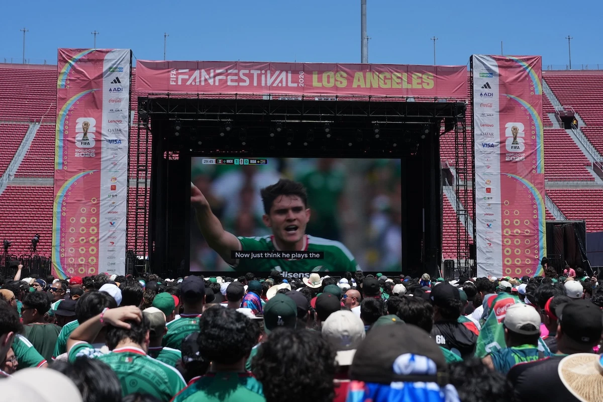 Fans watch Mexico and South Africa play on a video screen during the FIFA World Cup 2026 Fan Festival at Los Angeles Memorial Coliseum. (Imagn Images)