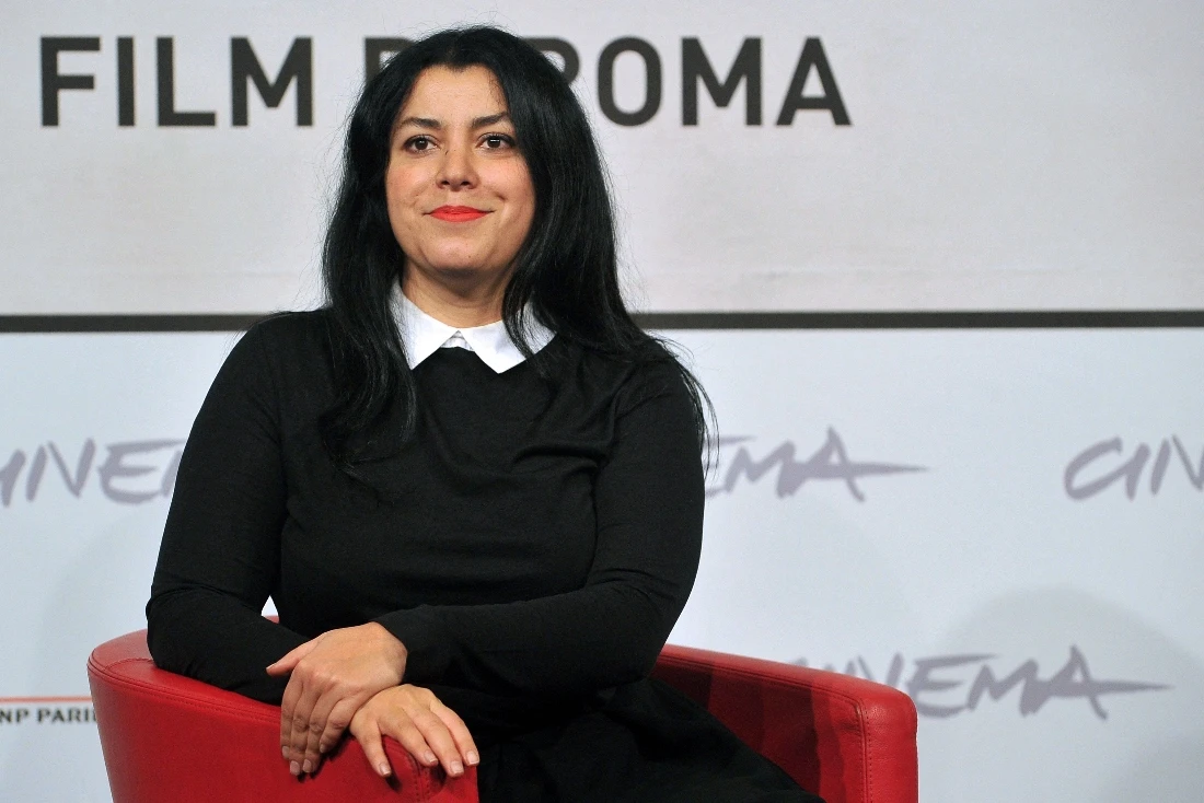 Iranian writer and film director Marjane Satrapi poses during the photocall of her latest film "La bande des Jotas" (Gang of the Jotas) in Rome, Italy. (AFP)