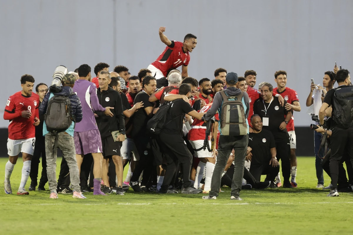 Egypt's players celebrate after the FIFA World Cup 2026 Africa qualifier football match between Djibouti and Egypt at the Larbi Zaouli Stadium in Casablanca on October 8, 2025. (File/AFP)