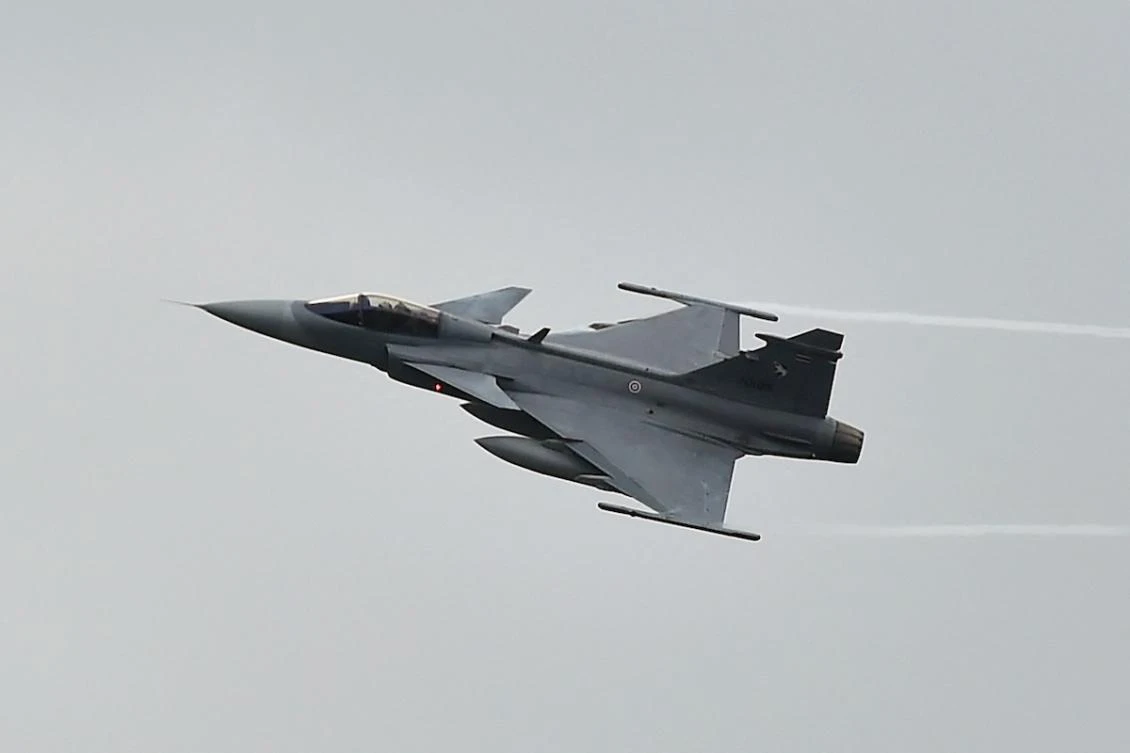 A Royal Thai Air Force JAS 39 Gripen fighter jet maneuvers during a show at Chulaporn military camp opened to the public for Thailand's National Children's Day in the southern province of Narathiwat on January 10, 2026. (FILE/AFP)