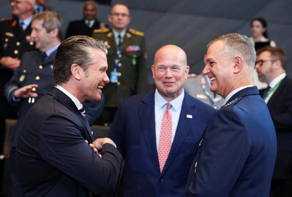 US Secretary of Defense Pete Hegseth interacts with NATO Supreme Allied Commander Europe (SACEUR) General Alexus G. Grynkewich as they attend a meeting of the North Atlantic Council (NAC) during the NATO Defence Ministers' meeting at the alliance's headquarters in Brussels, Belgium, June 18, 2026. (REUTERS)
