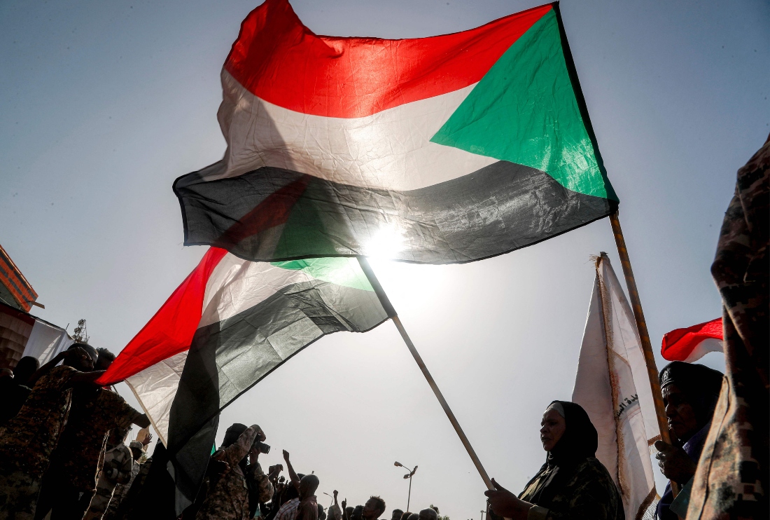 Members of the pro-Sudanese army popular resistance group gather for a rally supporting the army position in Darfur, Kordofan, Sudan. (AFP)