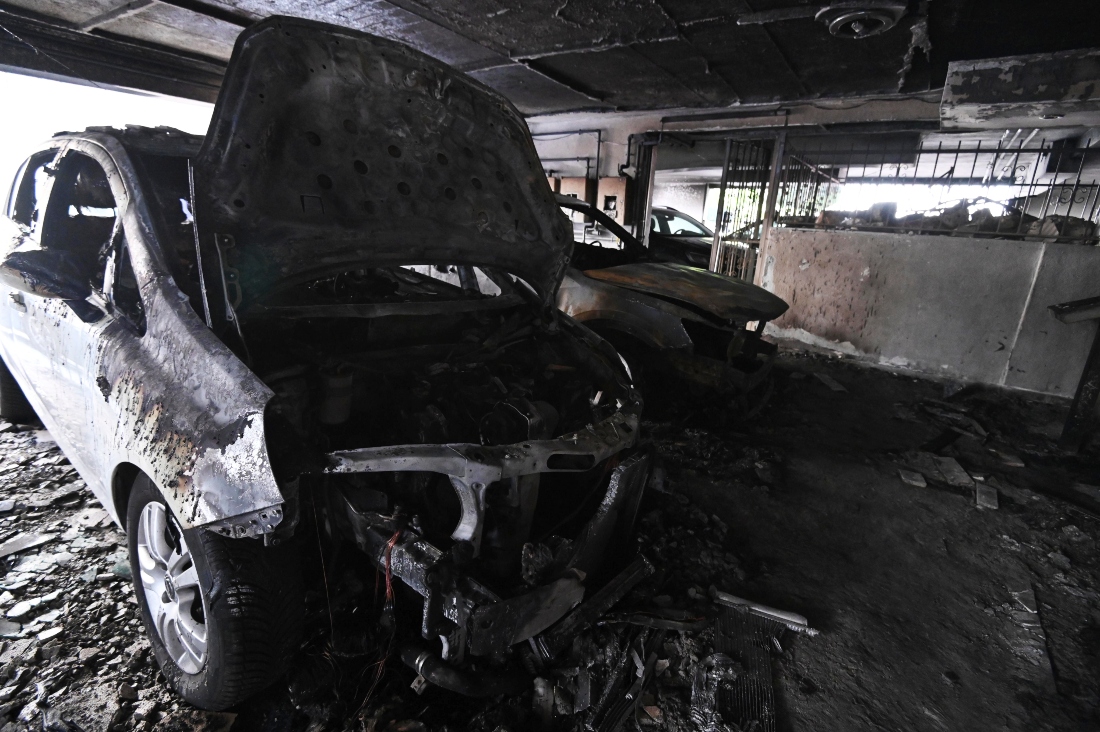 Burned vehicles are seen following firebomb attacks that apparently targeted members of Greece's governing conservative New Democracy party in the northern port city of Thessaloniki, Greece. (AP)
