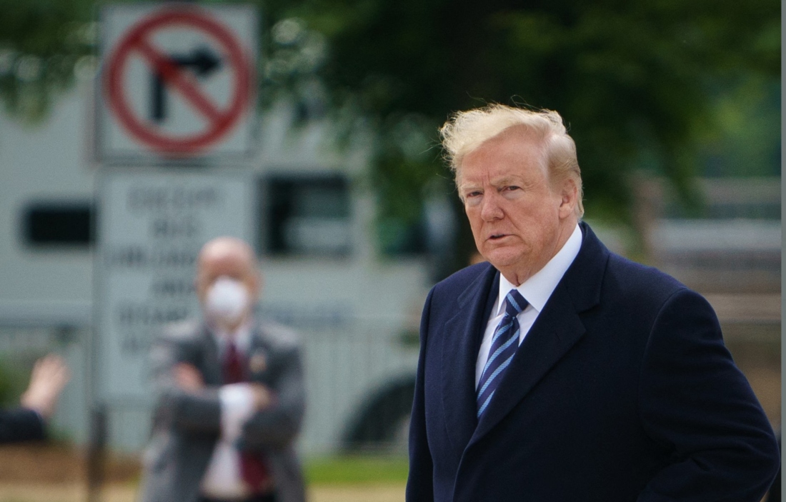 US President Donald Trump takes part in a ceremony commemorating the 75th anniversary of Victory in Europe at the World War II Memorial in Washington, DC, US. (AFP)