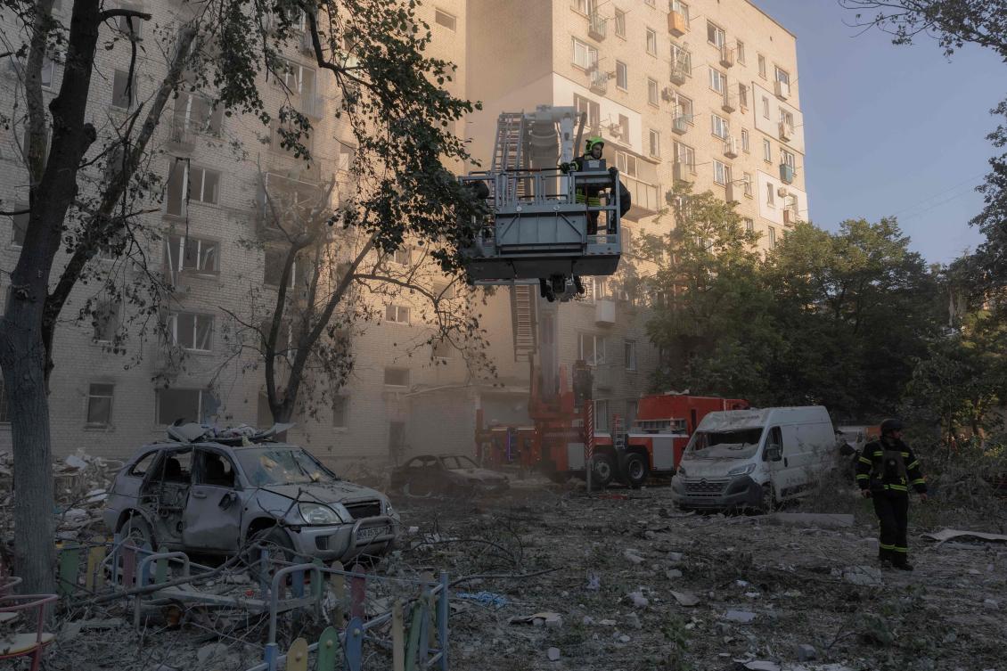 Ukrainian firefighters work at the site of a residential building damaged following a Russian air attack on the Ukrainian capital of Kyiv on July 2, 2026, amid the Russian invasion in Ukraine. (AFP)