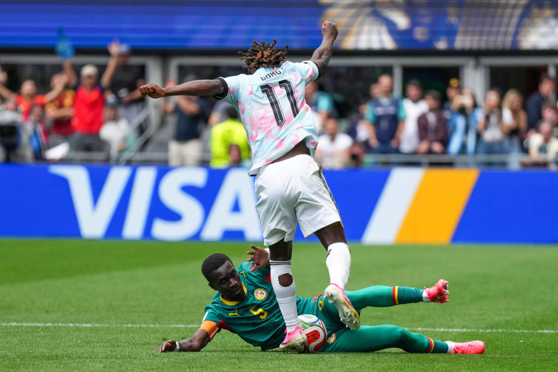 Belgium’s Jeremy Doku plays against Senegal’s Idrissa Gana Gueye during their World Cup round of 32 match in Seattle, Jul. 1, 2026. (AP)