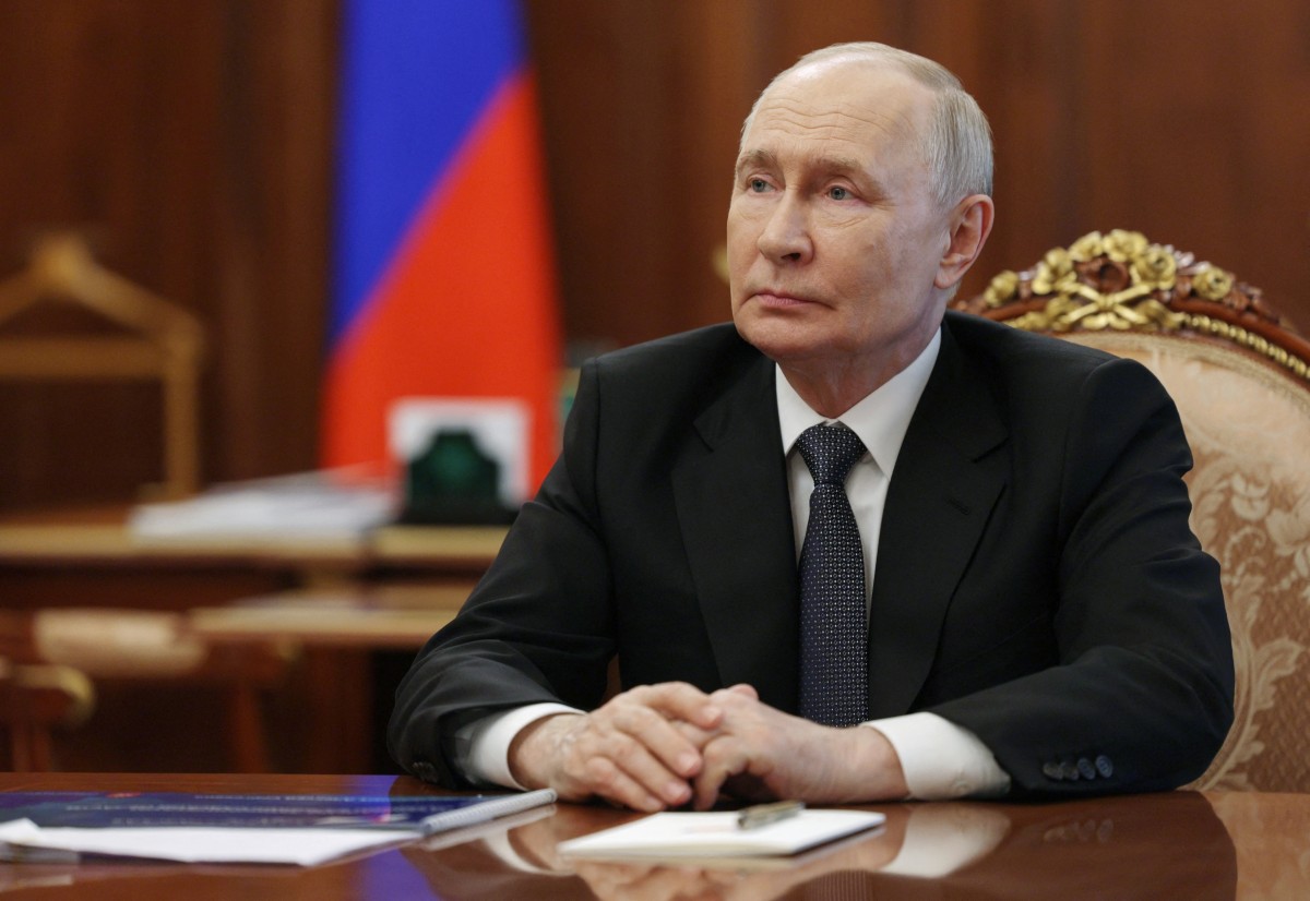 Russia's President Vladimir Putin attends a meeting with the Kaliningrad region governor in Moscow, Russia. (AFP)