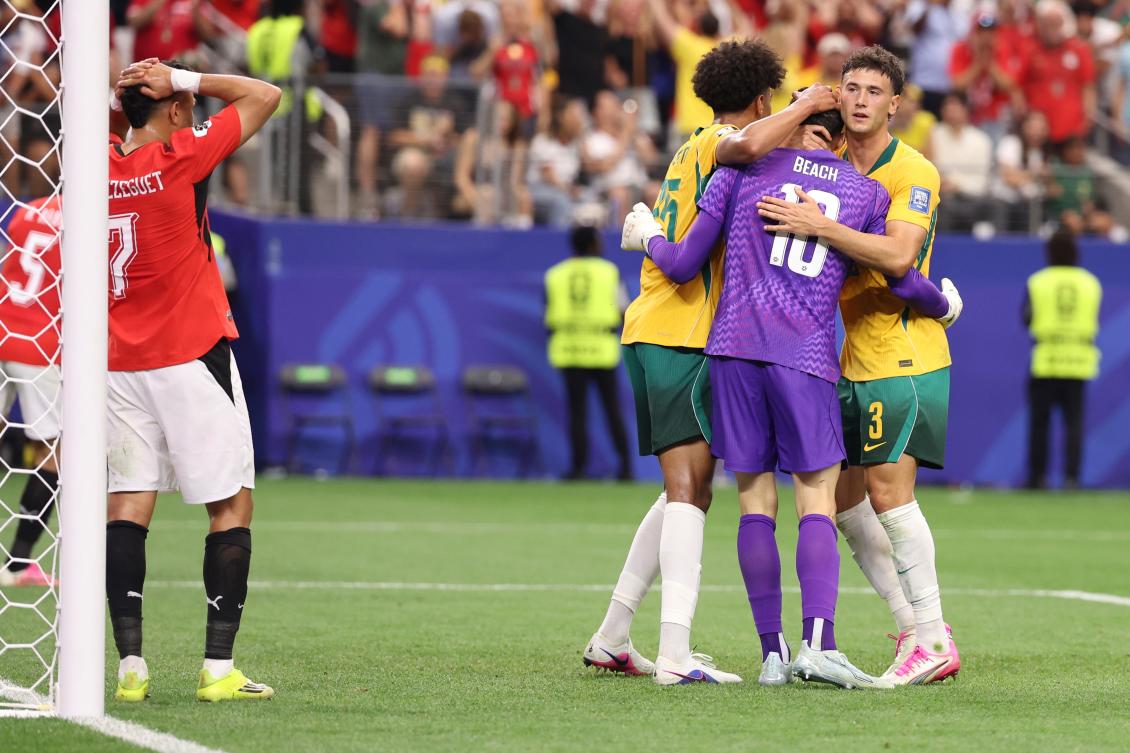 Egypt’s Trezeguet (7) reacts after a miss as Australia goalkeeper Patrick Beach (18) is congratulated by his teammates after a save during the World Cup round of 32 football match between Australia and Egypt in Arlington, Texas, near Dallas, Tuesday, Friday, July 3, 2026. (AP)