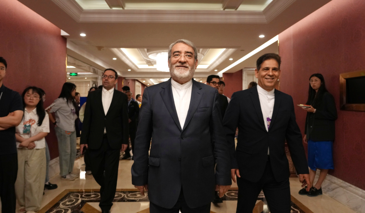 Iranian ambassador to China, Abdolreza Rahmani Fazli, center, arrives for a press conference on the sideline of the World Peace Forum held in Beijing, China, Saturday, July 4, 2026. (AP)