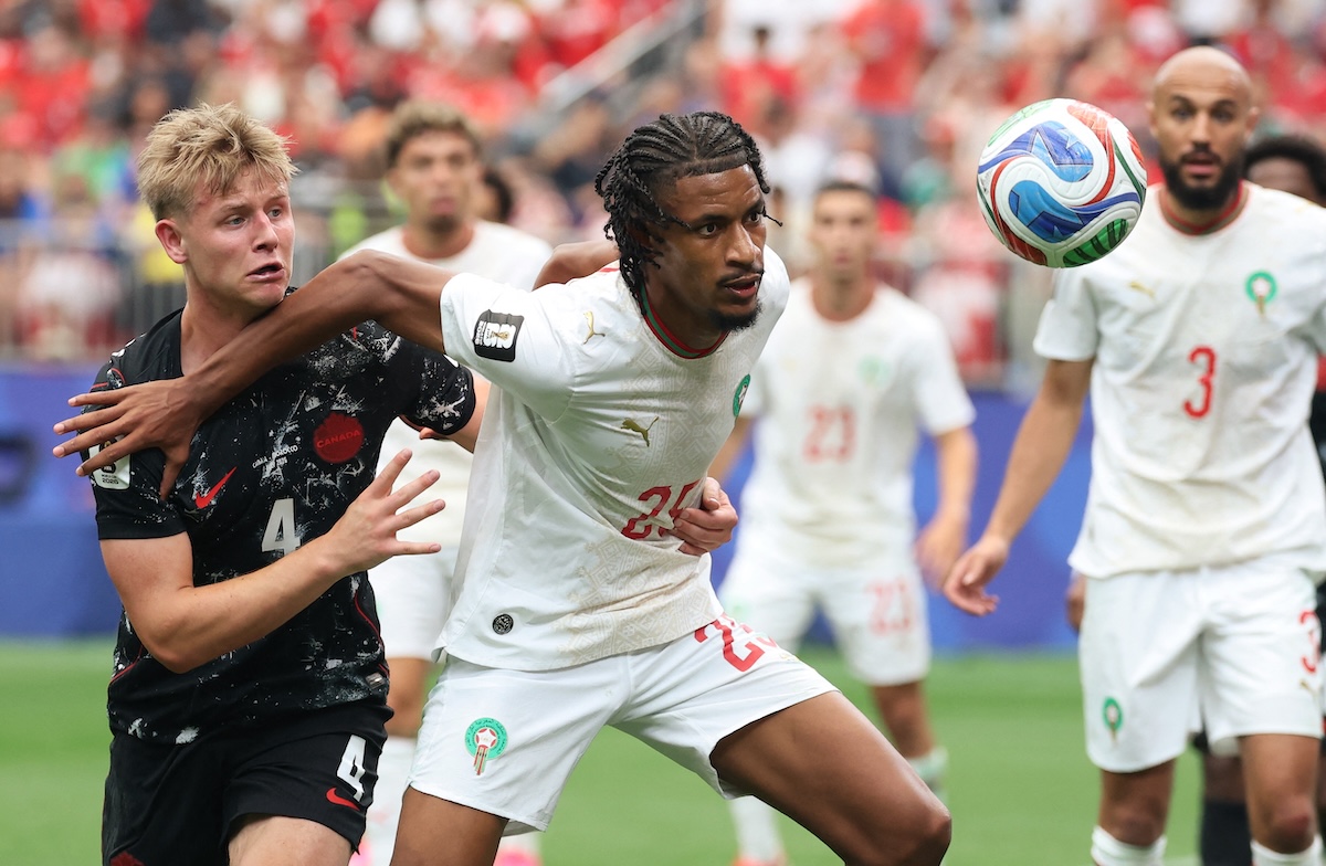Canada's defender #04 Luc de Fougerolles and Morocco's defender #25 Redouane Halhal fight for the ball during the 2026 World Cup round of 16 football match between Canada and Morocco at the Houston Stadium in Houston on July 4, 2026. (FILE/AFP)